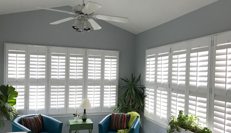 Dallas sunroom with fan and shutters